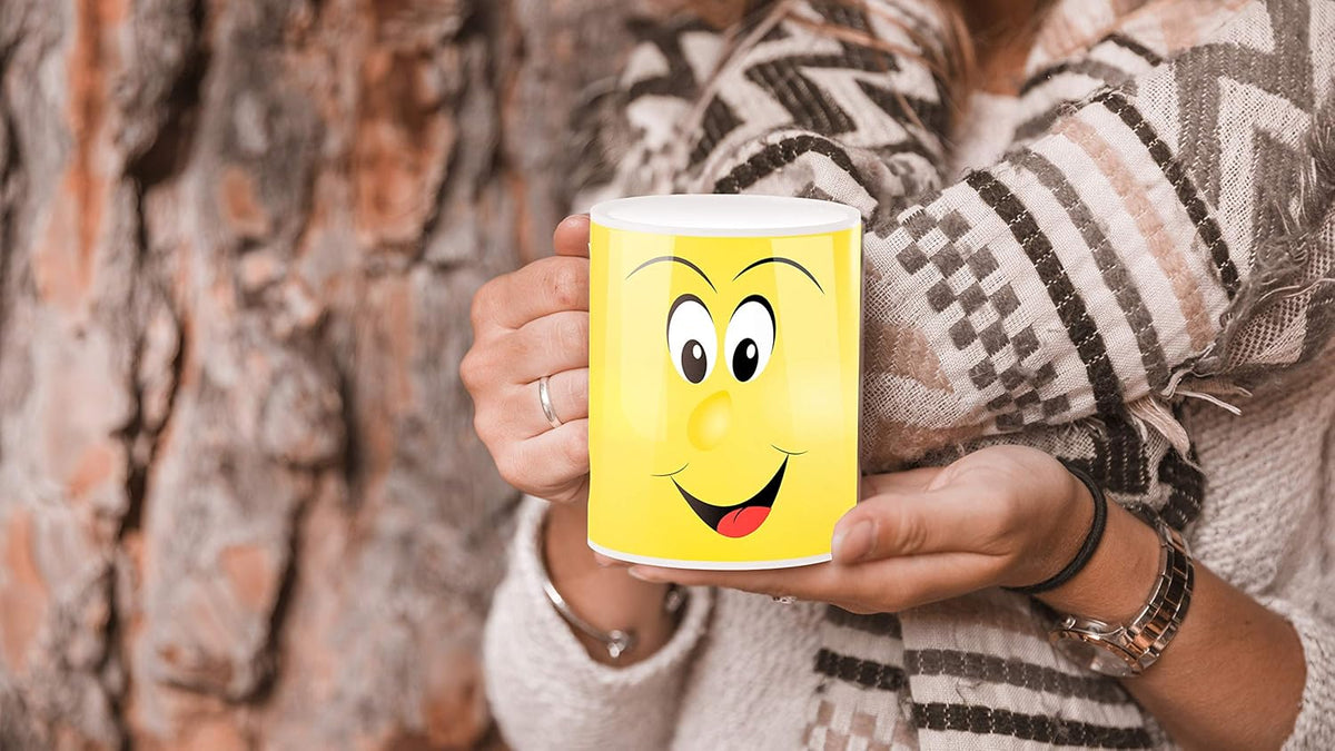 Color Changing Coffee Mug - 11 Ounce Heat Sensitive Mug for Cartoon Lovers with a Funny Yellow Smiley Face - Unique Heat Changing Mug - Ceramic Coffee Tea Cup with Fun Gift Box